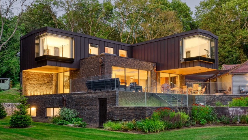 1. HERO Brook Cottage Thudersley Brentwood essex underground parking roof lights New Build night view