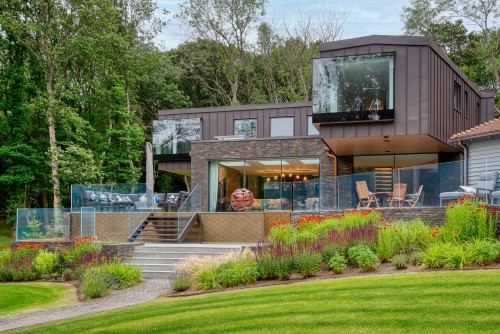 Brook Cottage Thudersley Brentwood essex underground parking roof lights New Build Full shot 