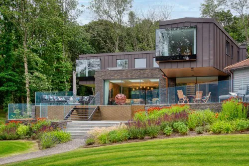 Brook Cottage Thudersley Brentwood essex underground parking roof lights New Build Full shot 