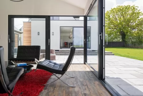 The Elms Ongar Residential Extension open plan kitchen diner sliding doors lounge area