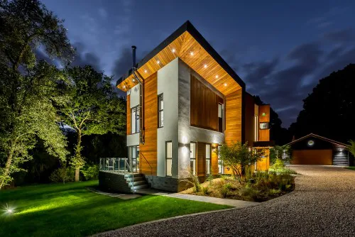 Yggdrasil Billericay butterfly butterfly winged form new build greenbelt timber cladding New Build Contemporary Home