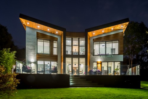 Yggdrasil Billericay butterfly wing formed zinc wrap Two storey green belt timber cladding New Build Contemporary Home