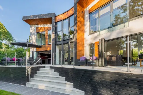 Yggdrasil Billericay zinc wraped New Build Contemporary Home full height windows