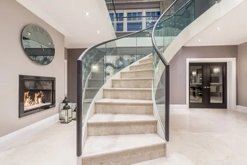Hillwood House Shenfield New Build Traditional Home 4 storey main entrance hall Curved Stairway Atrium fireplace