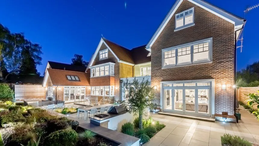 Hillwood House Shenfield New Build Traditional Home Garden Landscaping Alfresco dining Night View