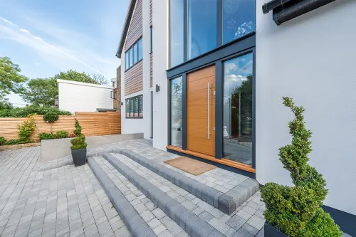 Well Lane Langdon Hills Essex Residential timber cladding render steelwork sedum roof detached single garage