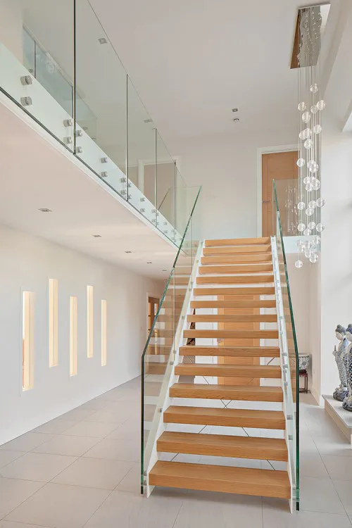 Noodles Hutton Mount Shenfield 645m New Build Hybrid Design Home stunning hallway entrance glass stairway