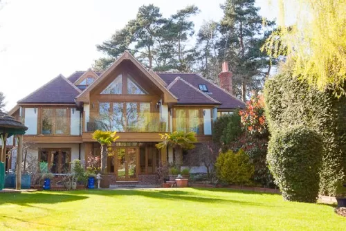 E lodge shenfield essex private residence glass etched sliding doors balcony garden landscape contemporary detailing