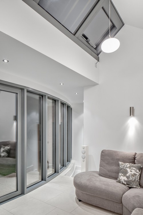 York Curve Shenfield Essex Contemporary Link Extension Family Room Roof windows Night view